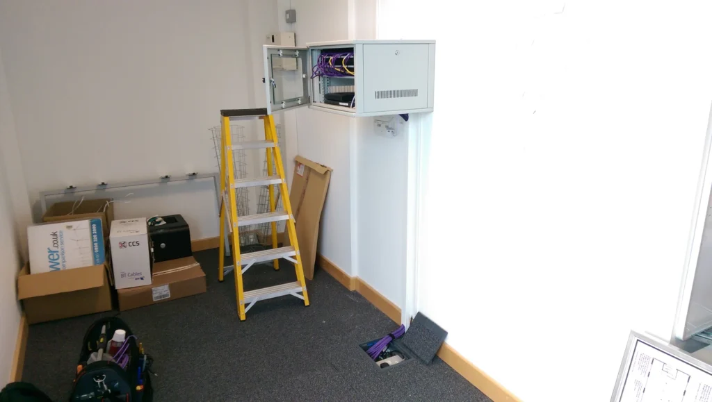 ...data cabinet finished. Since we're qualified to work on BT sockets we relocated them under the cabinet...