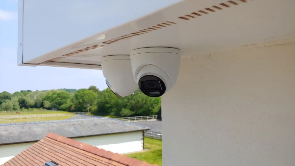 Pair of 4K colour night vision cameras fitted neatly on soffit with no visible cables...